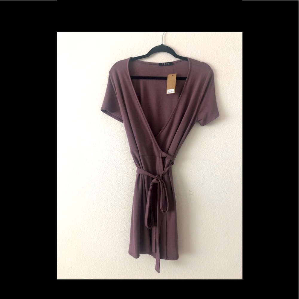 Mini wrap dress in Mauve color. NWT